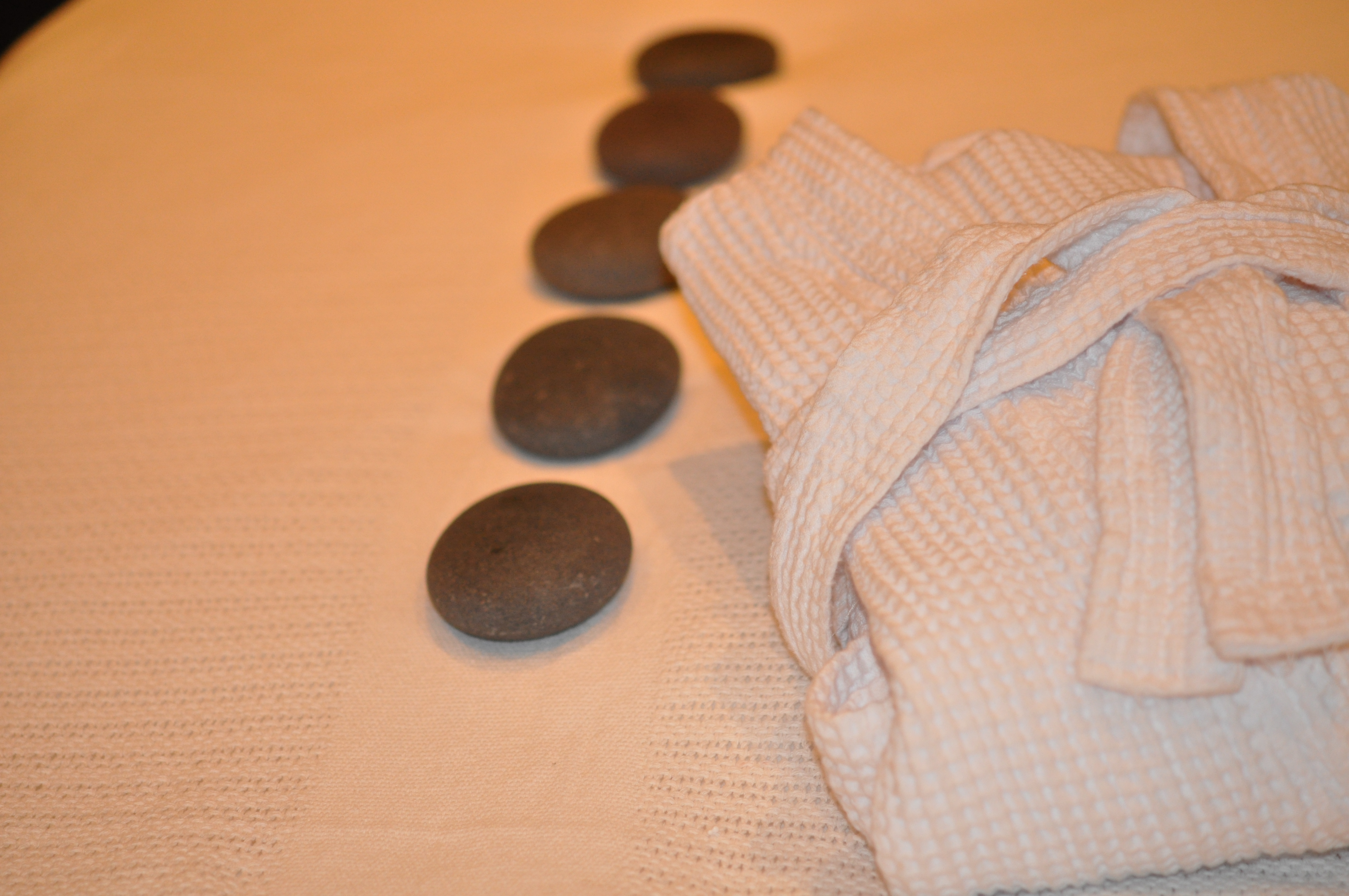 Massage Therapy at DermaSpa Ajax Pickering in Durham Region:  Hot Stone Massage